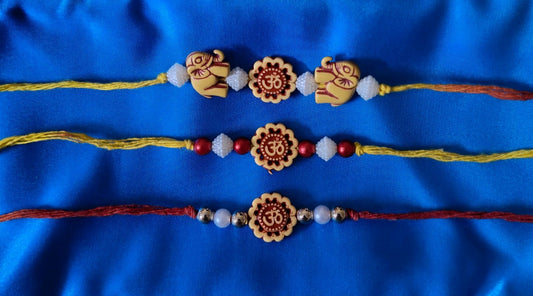 Om Blossom & Elephant Rakhi Set (Pack of 3)